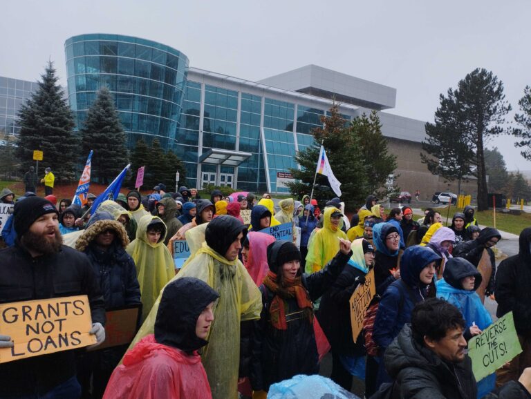 MUN students brave the rain to protest for free and accessible education