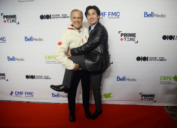 Prime Minister Mark Carney with Hudson Williams, star of 'Heated Rivalry' (Patrick Doyle The Canadian Press)